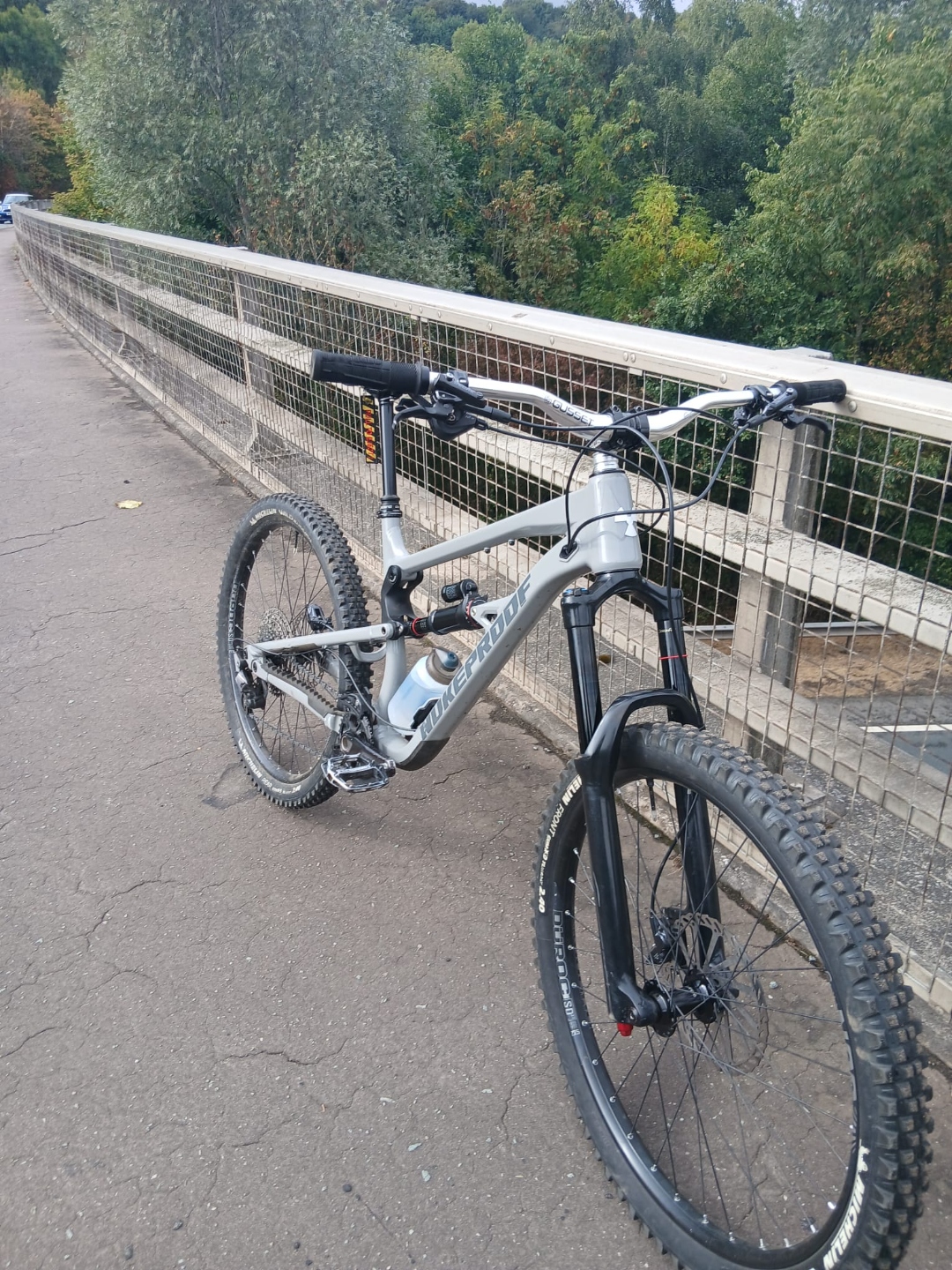 Alfie Thomas in mid-air on his mountain bike during a jump session.